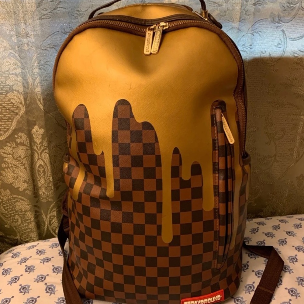 Spray ground backpack